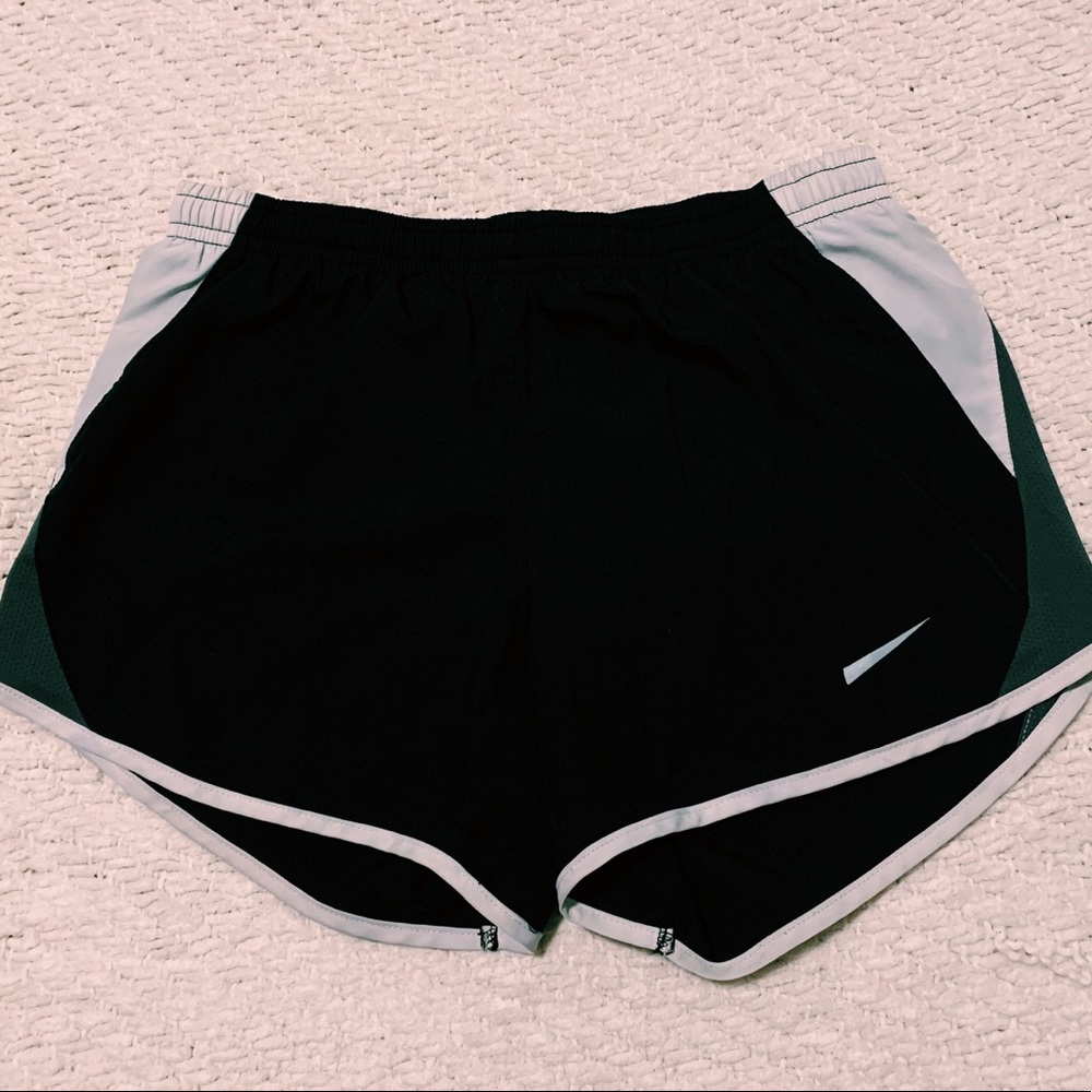 Black woman’s Nike running shorts